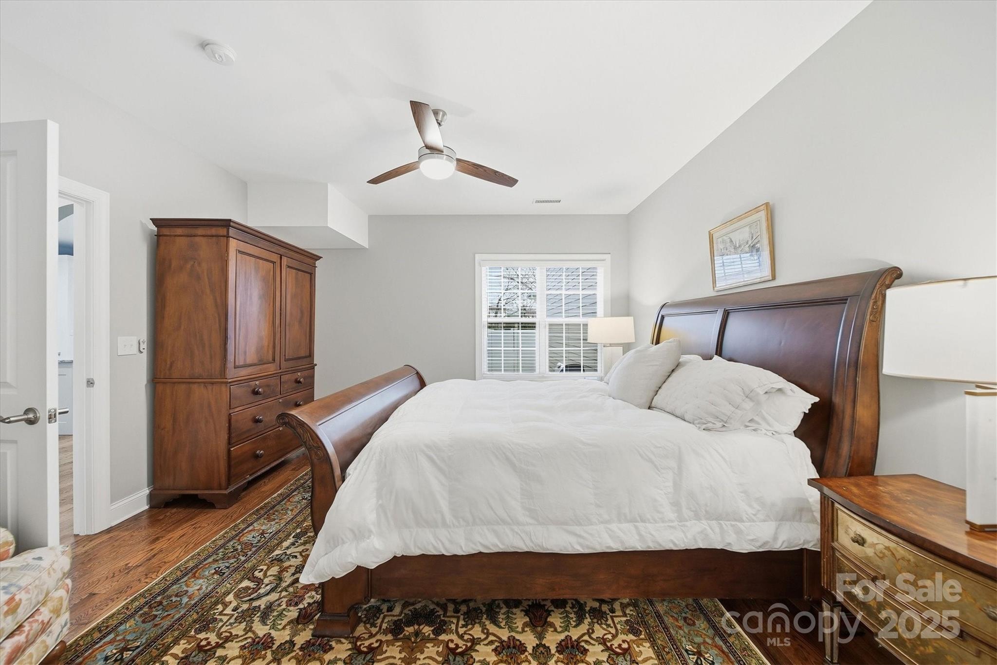 1449 North Center Street Hickory, NC 28601 - Photo 15 of 34 a bedroom with a bed and wooden floor