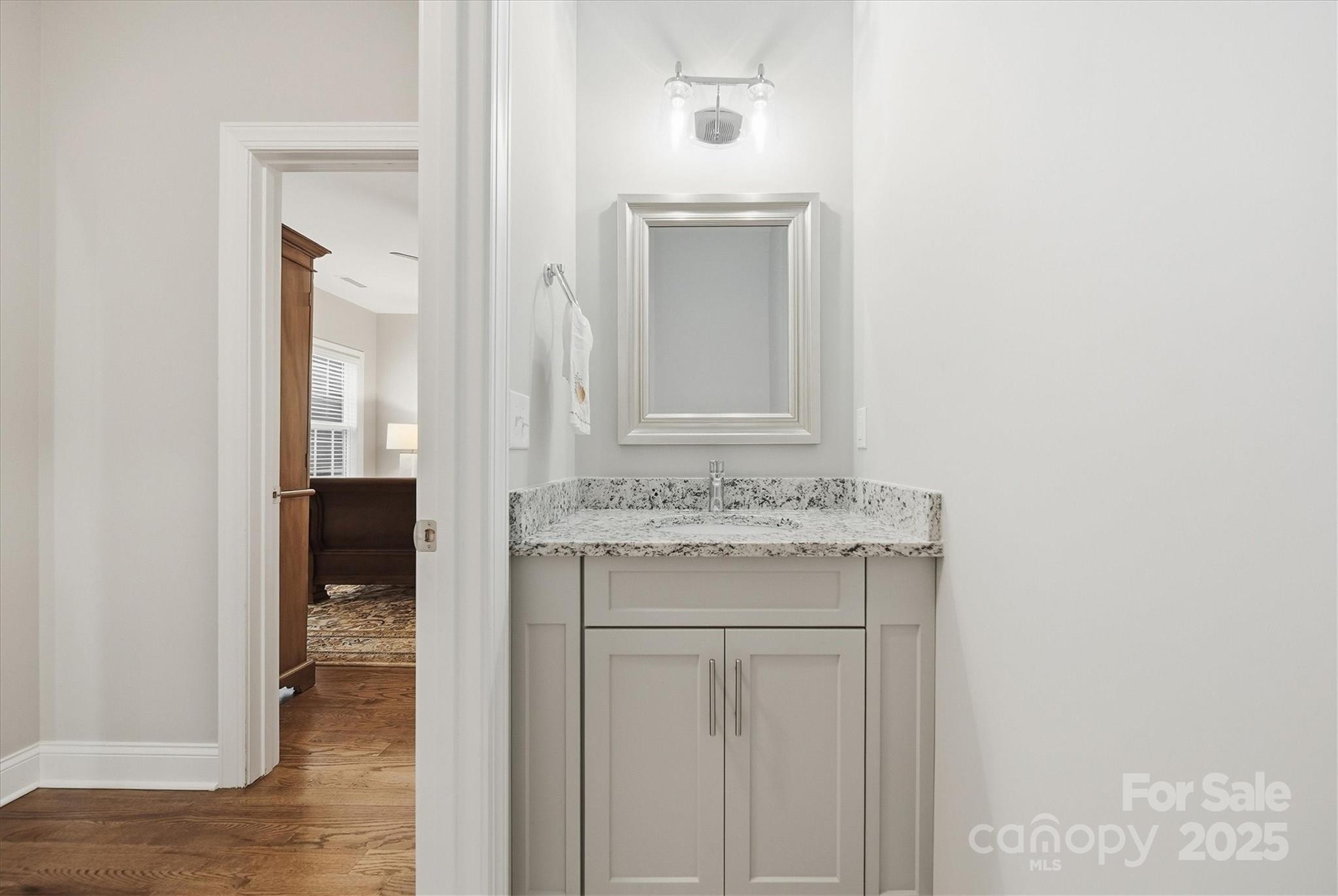 1449 North Center Street Hickory, NC 28601 - Photo 20 of 34 a bathroom with a sink and a mirror