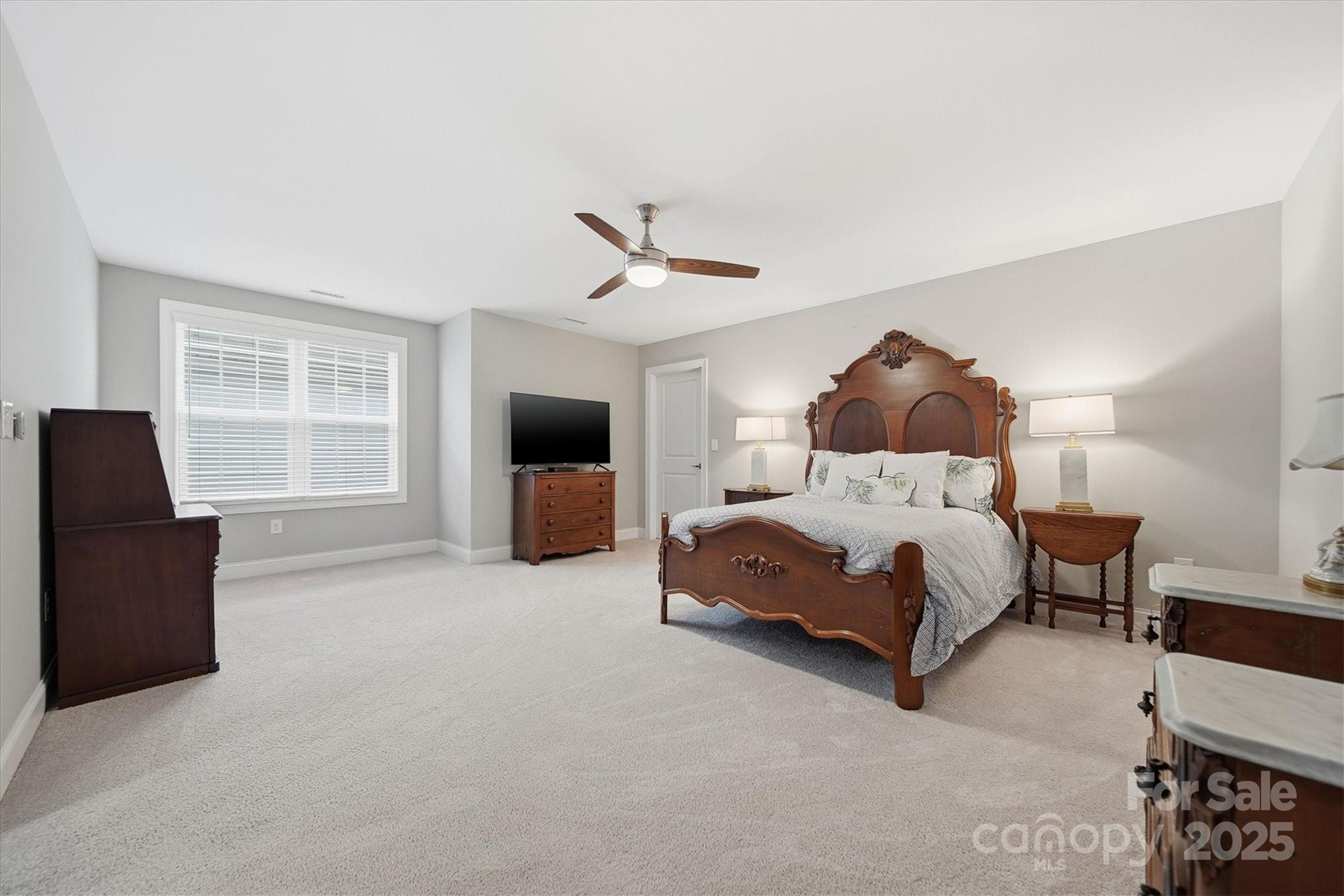 1449 North Center Street Hickory, NC 28601 - Photo 21 of 34 a bedroom with a bed and a couch