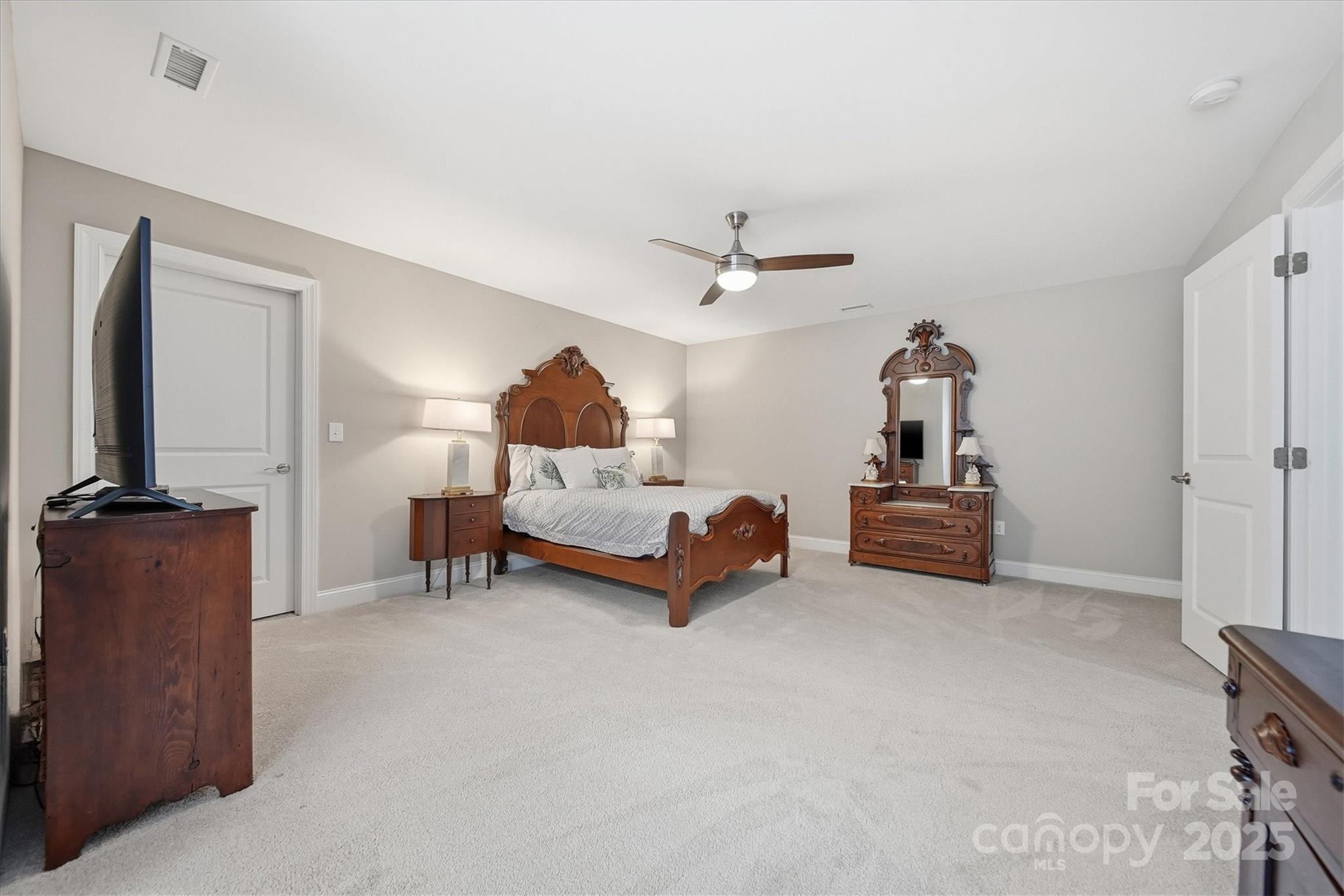 1449 North Center Street Hickory, NC 28601 - Photo 22 of 34 a living room with furniture and a flat screen tv