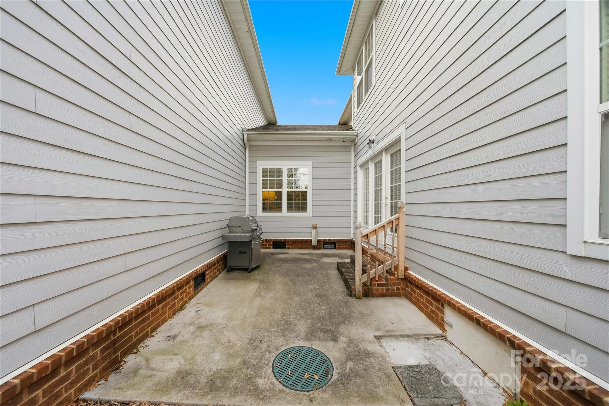 1449 North Center Street Hickory, NC 28601 - Photo 26 of 34 a view of a patio with chair and table in the patio