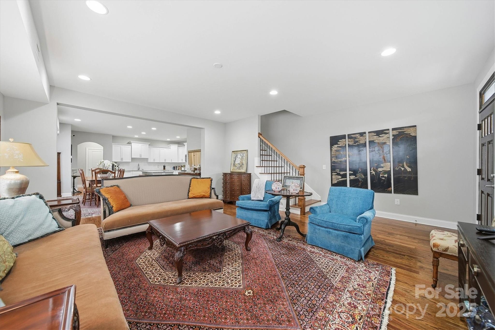 1449 North Center Street Hickory, NC 28601 - Photo 5 of 34 a living room with furniture kitchen view and a table