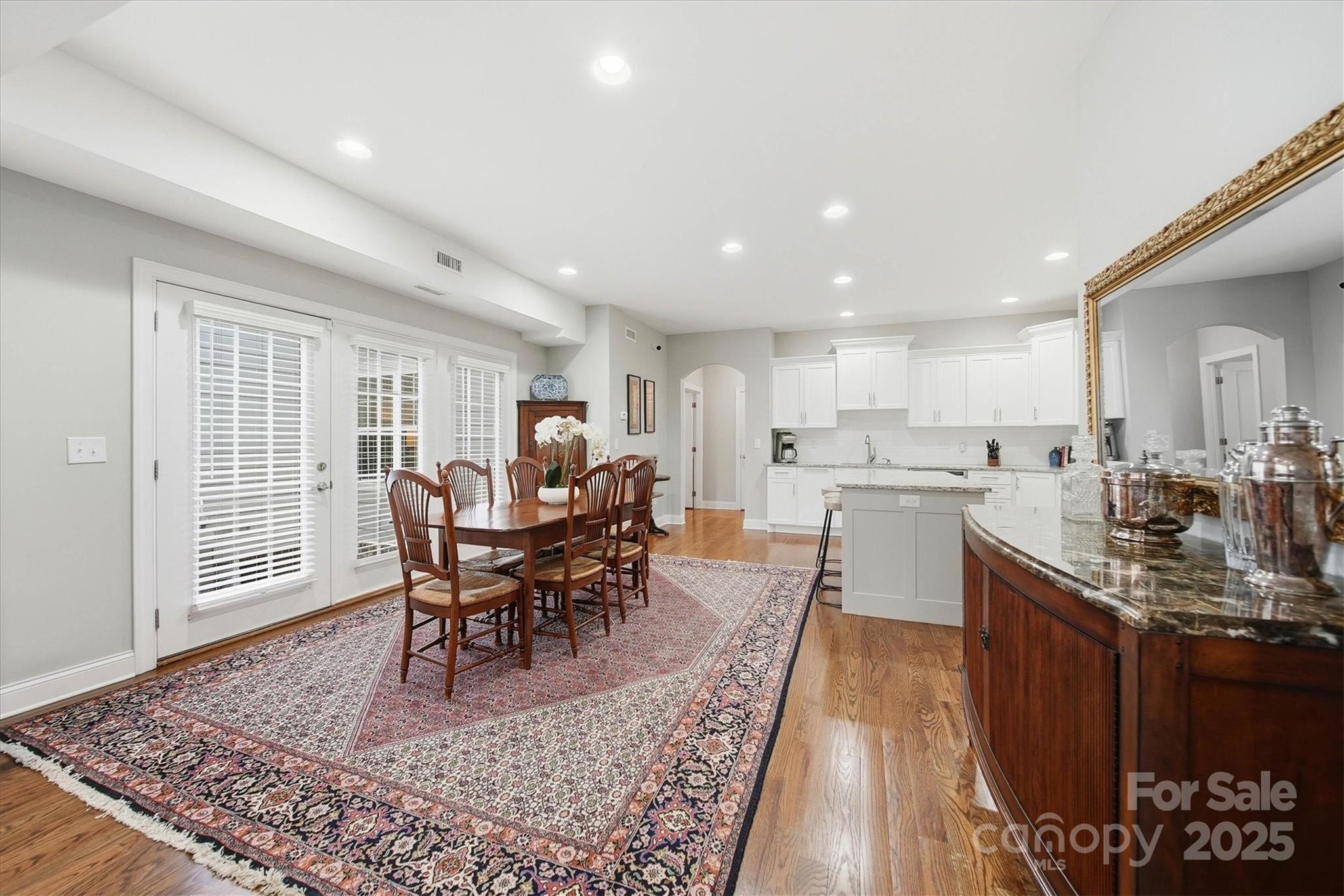 1449 North Center Street Hickory, NC 28601 - Photo 9 of 34 a view of a dining room with furniture window and wooden floor