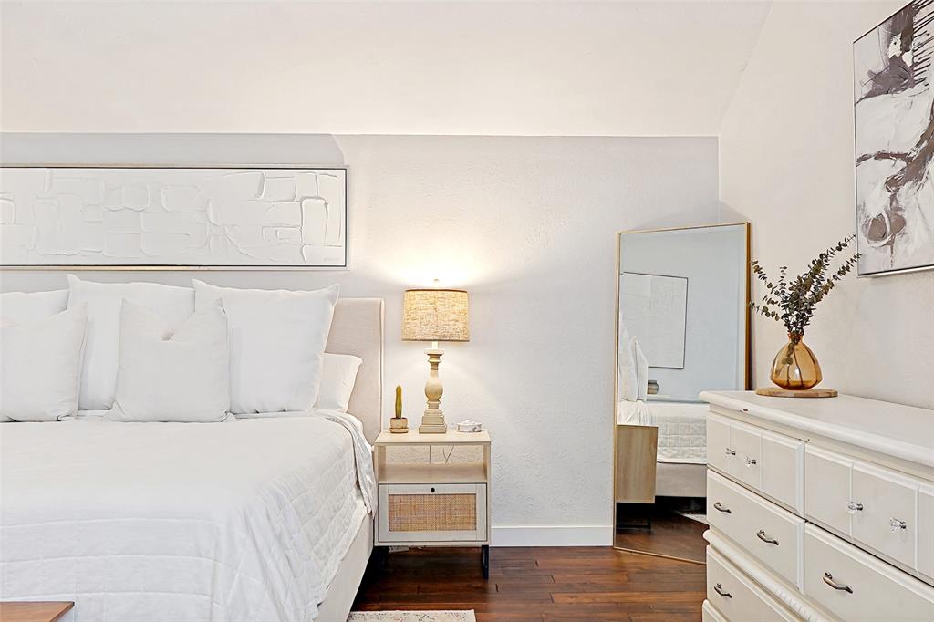 3642 Word Street Dallas, TX 75204 - Photo 22 of 29 a bedroom with a bed and a closet