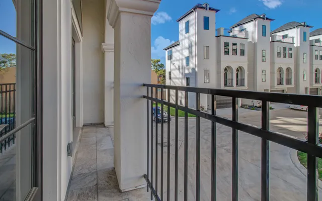 a white bath tub sitting next to a window
