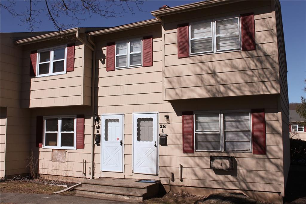 38 Ridge Road, Unit 2 Naugatuck, CT 06770 - Photo 1 of 1 a front view of a house with a large windows