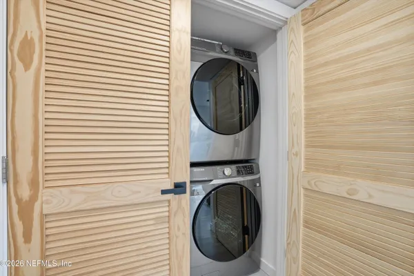 a close up view of a washer and dryer in a utility room