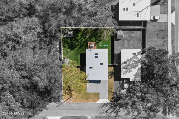 a brick house with a yard