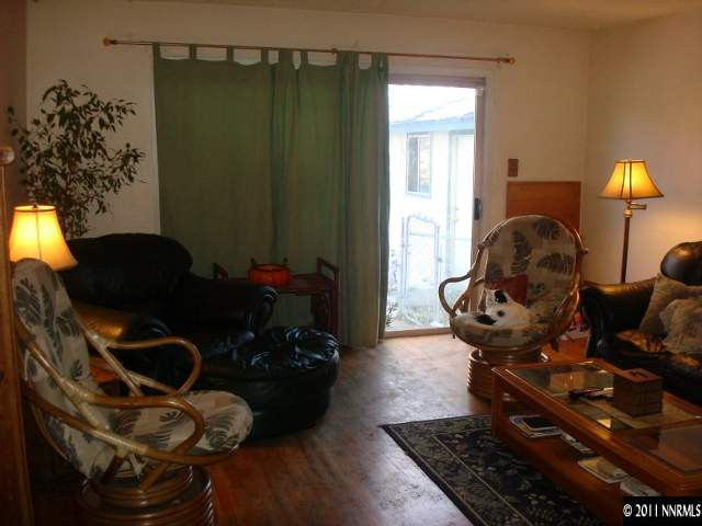 3445 West 7th Street Reno, NV 89503 - Photo 4 of 13 a room with furniture and a window