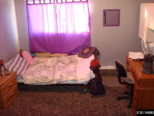 3445 West 7th Street Reno, NV 89503 - Photo 8 of 13 a bed room with a bed