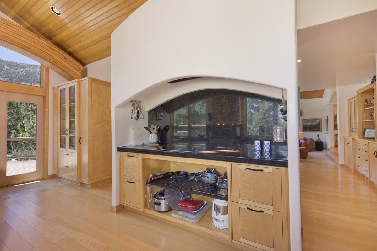 92 Garnet Street Mammoth Lakes, CA 93546 - Photo 12 of 50 Bar area featuring light wood-style flooring, wood ceiling, a high ceiling, and recessed lighting