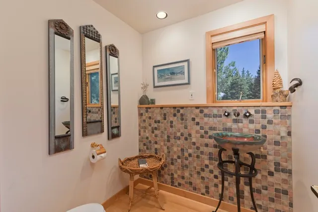 a bathroom with a bathtub and shower