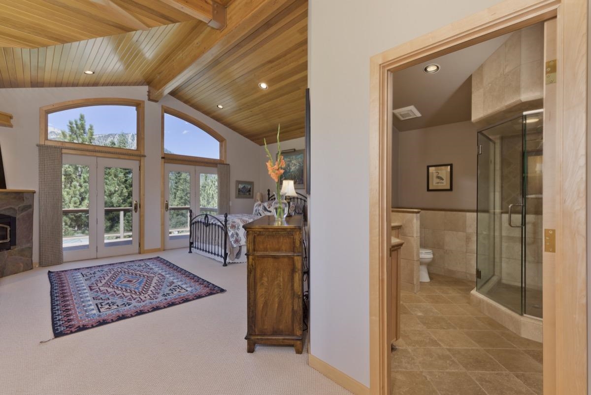 92 Garnet Street Mammoth Lakes, CA 93546 - Photo 21 of 50 Carpeted entryway featuring a wooden ceiling with exposed beams, recessed lighting, high vaulted cei