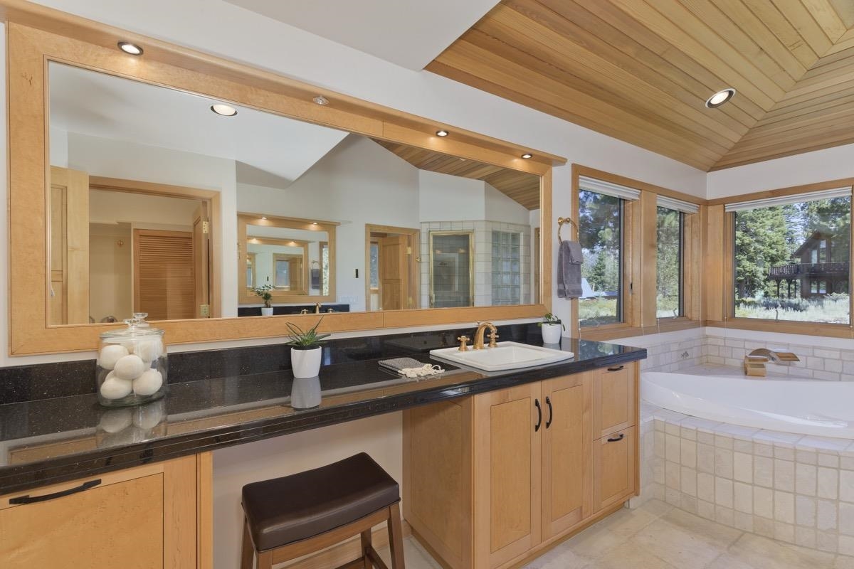 92 Garnet Street Mammoth Lakes, CA 93546 - Photo 27 of 50 Bathroom with vaulted ceiling, recessed lighting, vanity, a bath, and wood ceiling