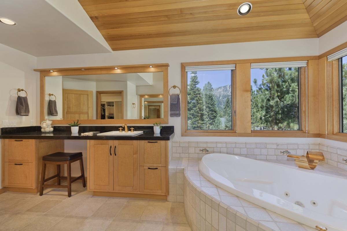92 Garnet Street Mammoth Lakes, CA 93546 - Photo 29 of 50 Full bath with recessed lighting, a whirlpool tub, vanity, wooden ceiling, and lofted ceiling