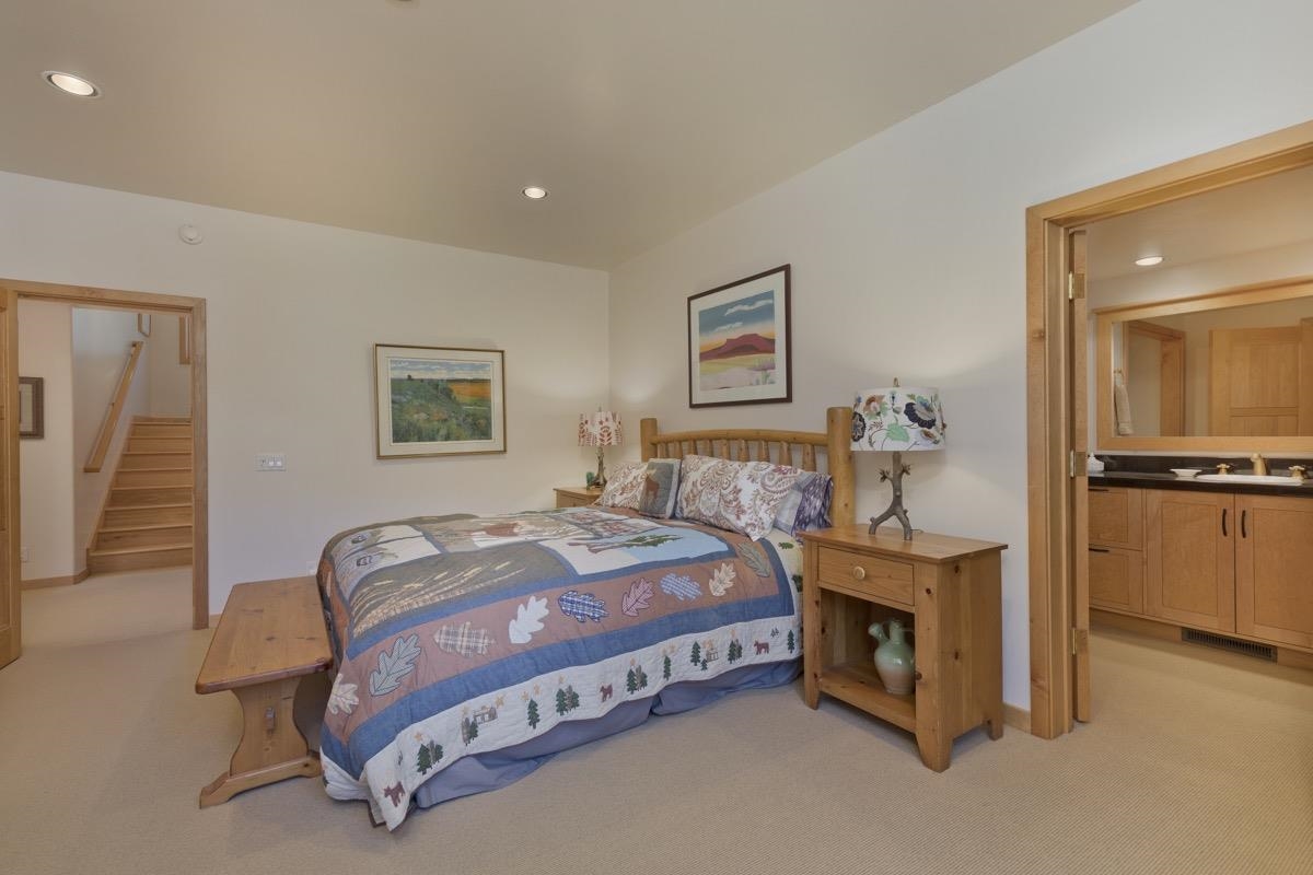 92 Garnet Street Mammoth Lakes, CA 93546 - Photo 31 of 50 Bedroom with recessed lighting, light colored carpet, and ensuite bath