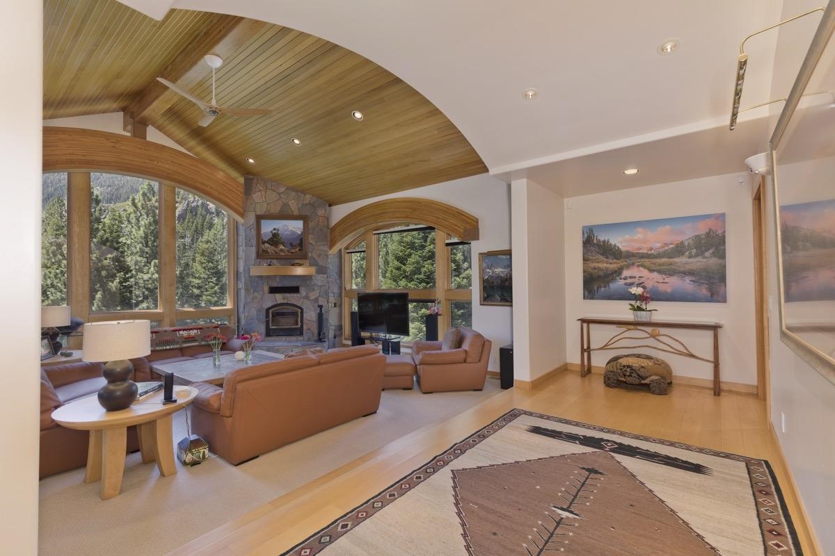 92 Garnet Street Mammoth Lakes, CA 93546 - Photo 4 of 50 Living area with wooden ceiling, wood finished floors, lofted ceiling, a fireplace, and recessed lig