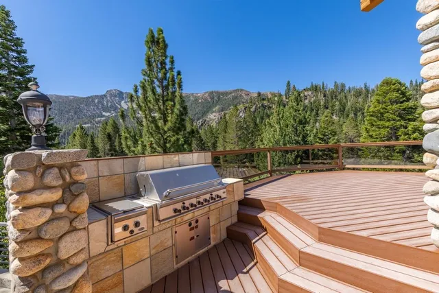 an empty room with windows and couches