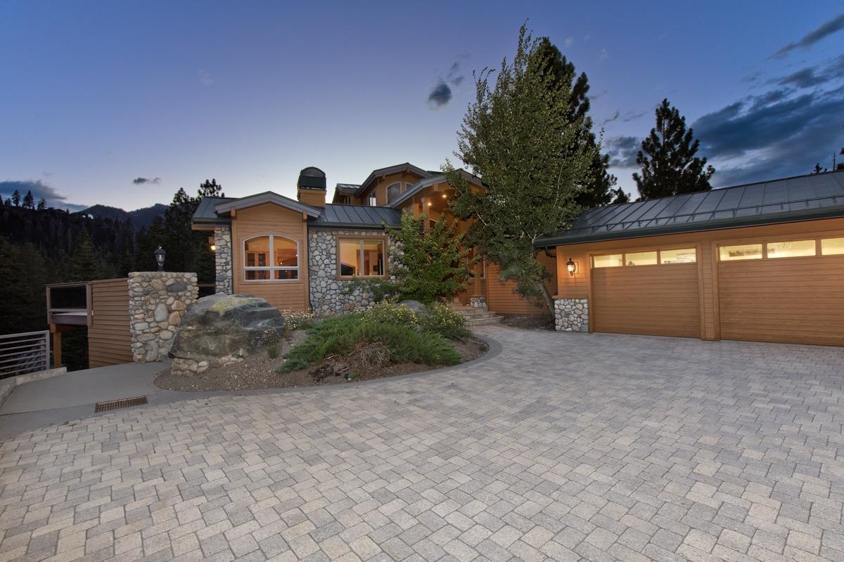 92 Garnet Street Mammoth Lakes, CA 93546 - Photo 49 of 50 View of front of home with stone siding, decorative driveway, a standing seam roof, and a metal roof