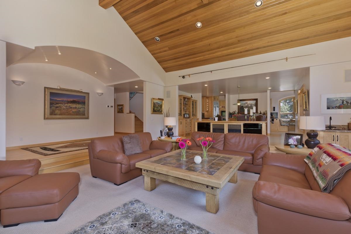 92 Garnet Street Mammoth Lakes, CA 93546 - Photo 7 of 50 Carpeted living area featuring wooden ceiling, recessed lighting, high vaulted ceiling, and stairs