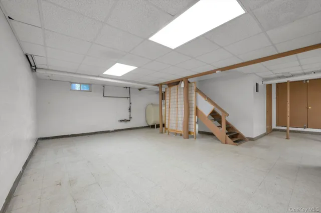 a view of an empty room with closet