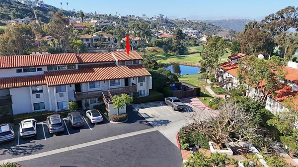 an aerial view of a house with sitting area and garden view