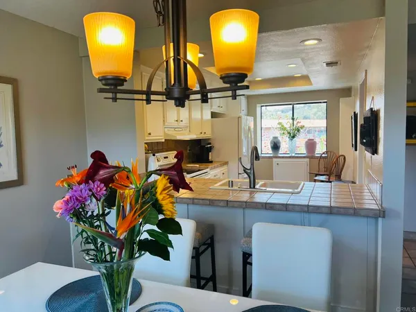 a kitchen with appliances and cabinets