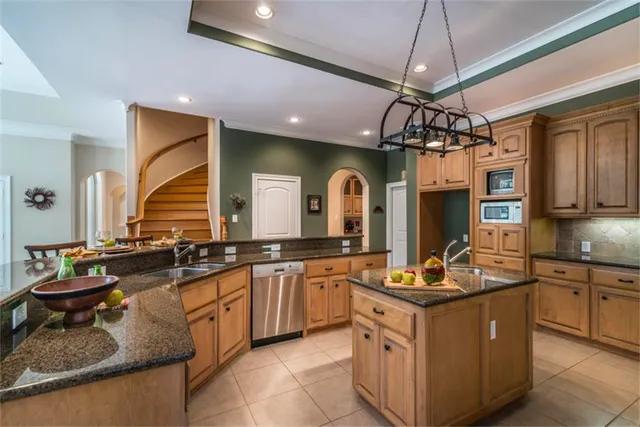 a kitchen with granite countertop lots of counter top space