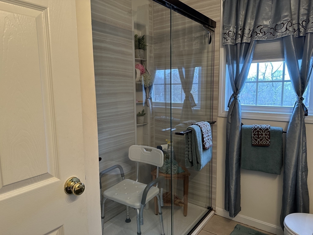 28 Ely Street Randolph, MA 02368 - Photo 14 of 28 a bathroom with a shower