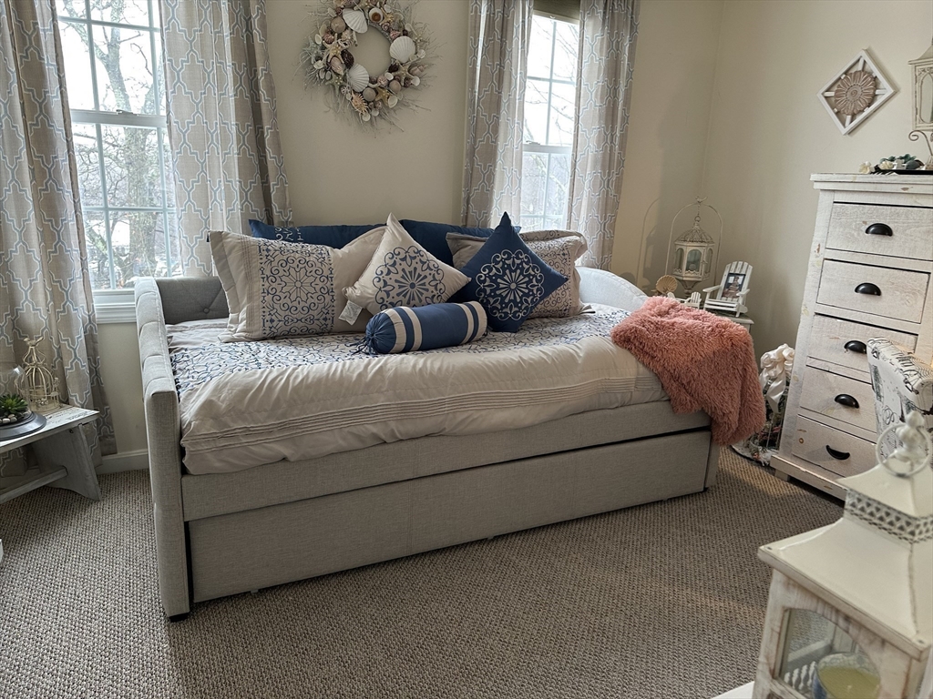 28 Ely Street Randolph, MA 02368 - Photo 15 of 28 a bedroom with a bed and a window