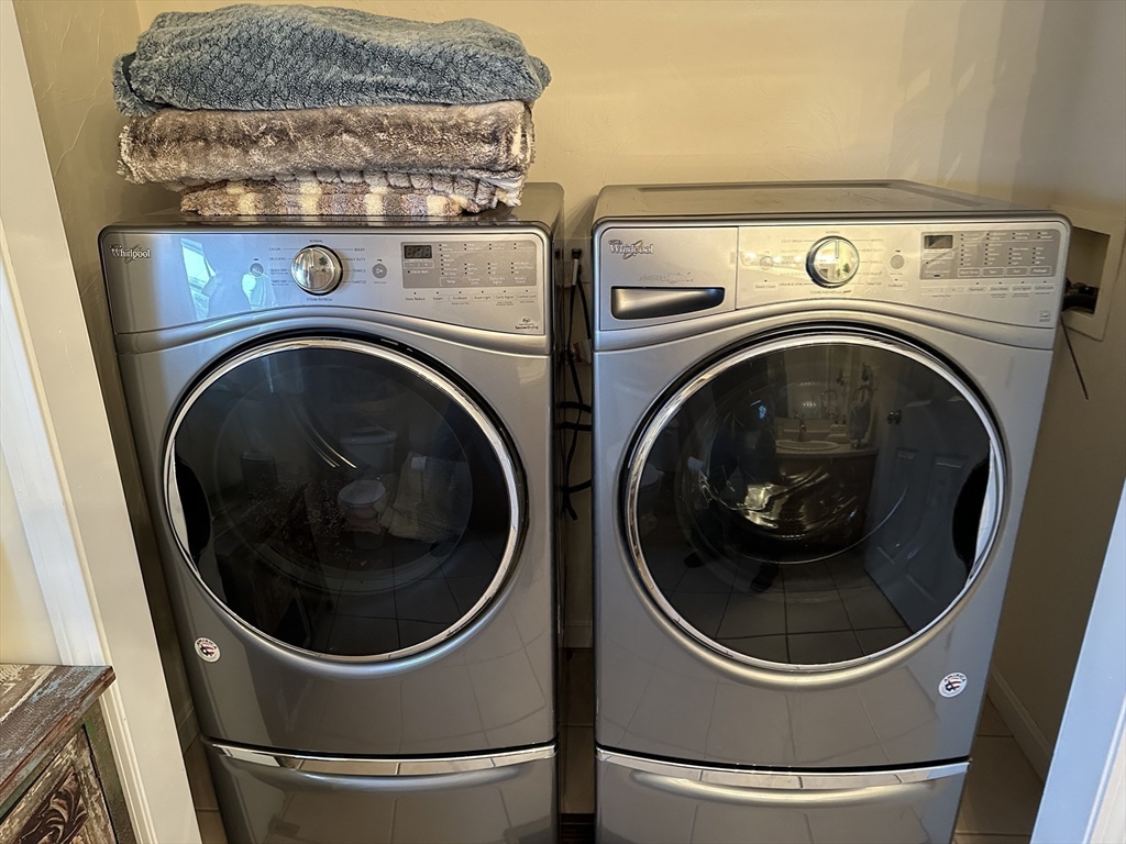 28 Ely Street Randolph, MA 02368 - Photo 19 of 28 a close up view of a washer and dryer