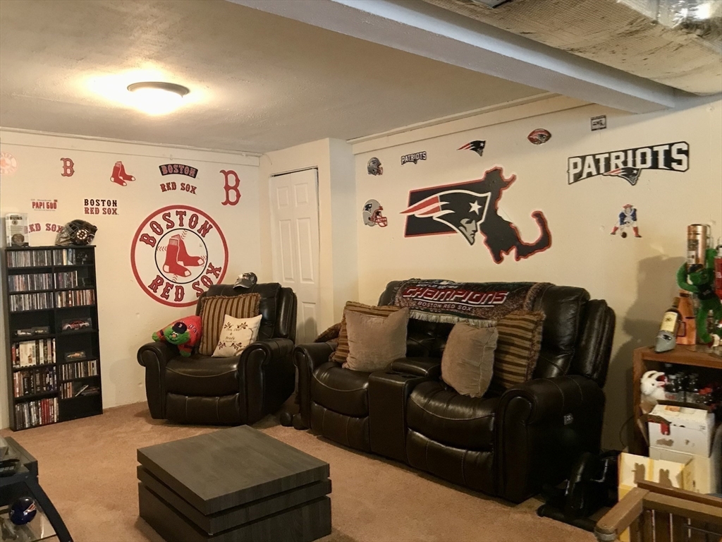 28 Ely Street Randolph, MA 02368 - Photo 20 of 28 a living room with furniture and a window