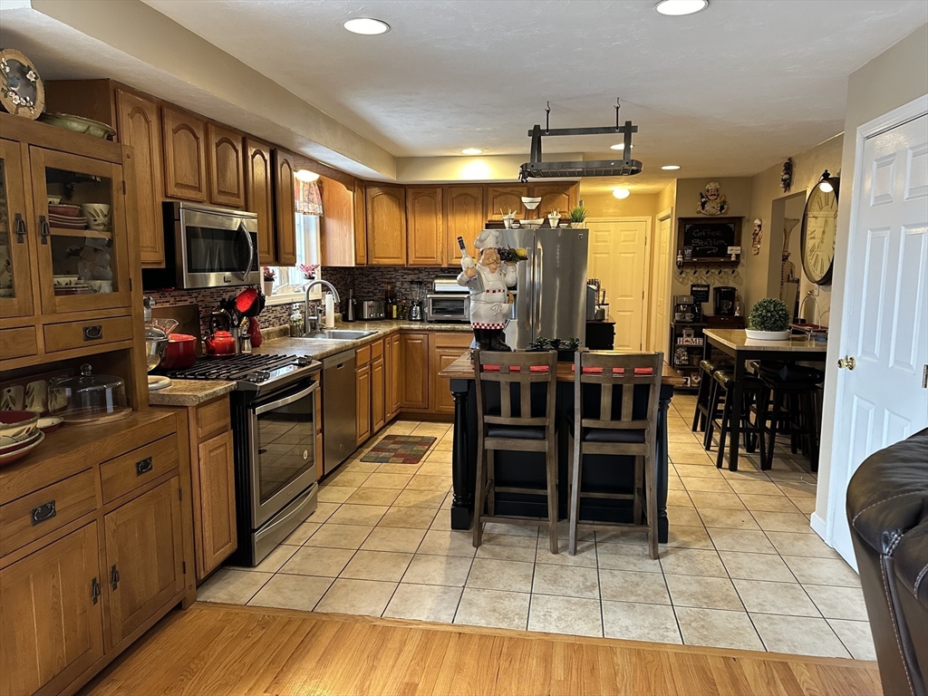 28 Ely Street Randolph, MA 02368 - Photo 5 of 28 a kitchen with lots of counter top space and appliances
