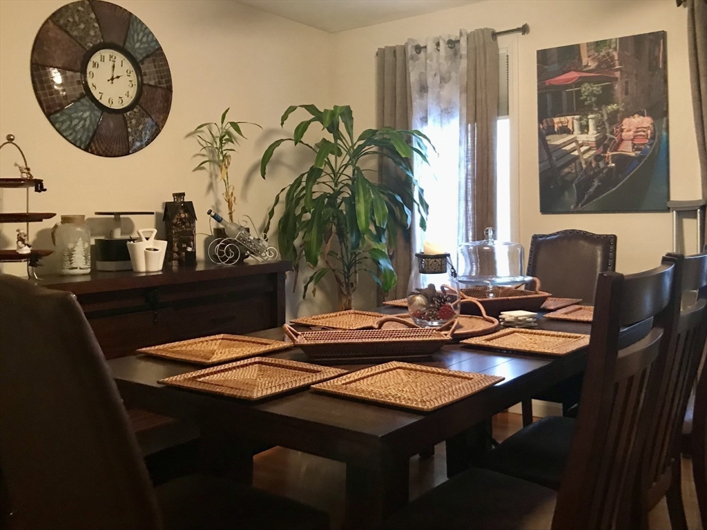 28 Ely Street Randolph, MA 02368 - Photo 10 of 28 a table and chairs with the table in it