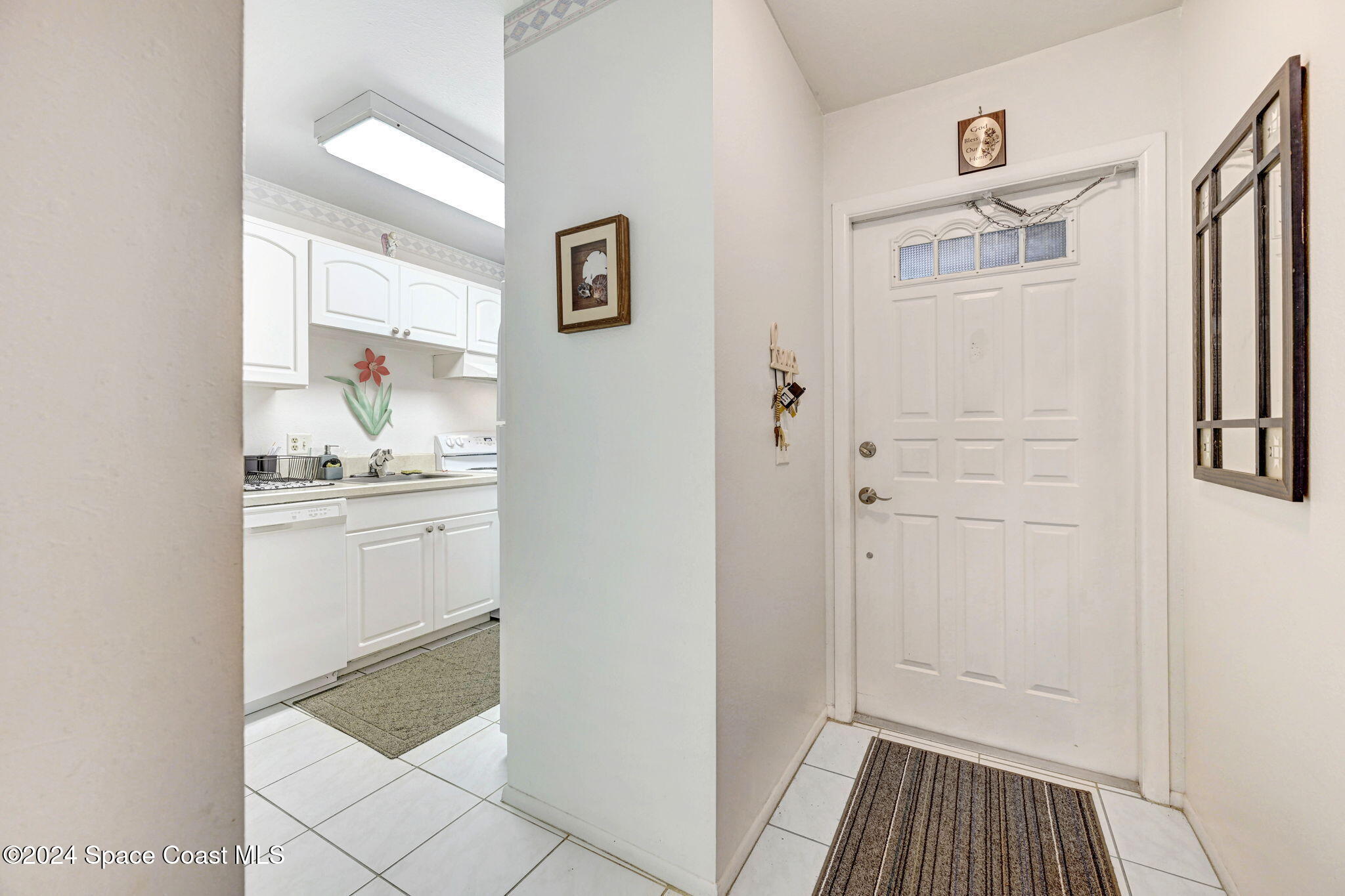815 Brae Court Northeast Palm Bay, FL 32905 - Photo 4 of 21 a bathroom with a sink a toilet and shower