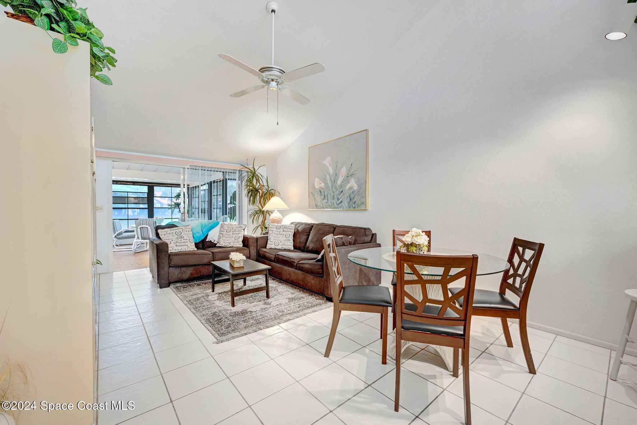 815 Brae Court Northeast Palm Bay, FL 32905 - Photo 10 of 21 a living room with furniture and a large window