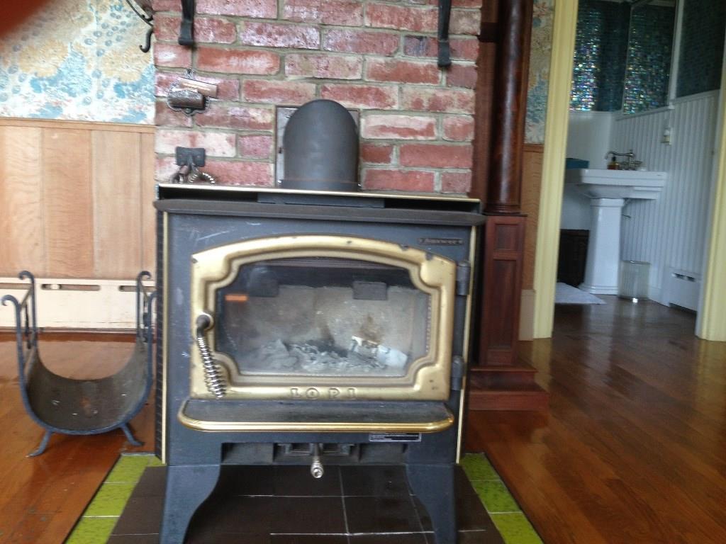 98 Reach Road Brooklin, ME 04616 - Photo 8 of 23 Lopi wood stove in Living Room with...