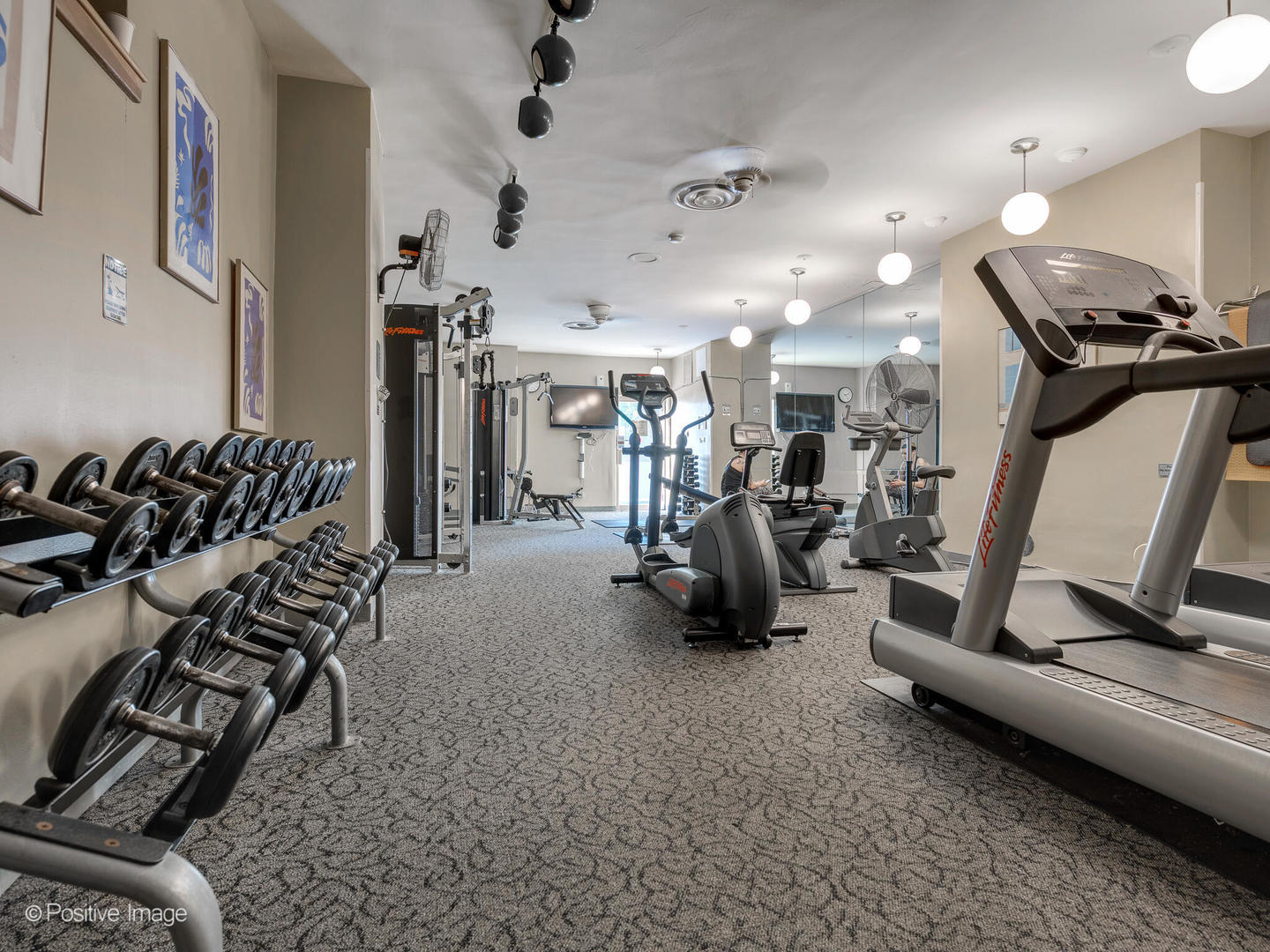 6301 North Sheridan Road, Unit 14O Chicago, IL 60660 - Photo 18 of 22 a view of a room with gym equipment
