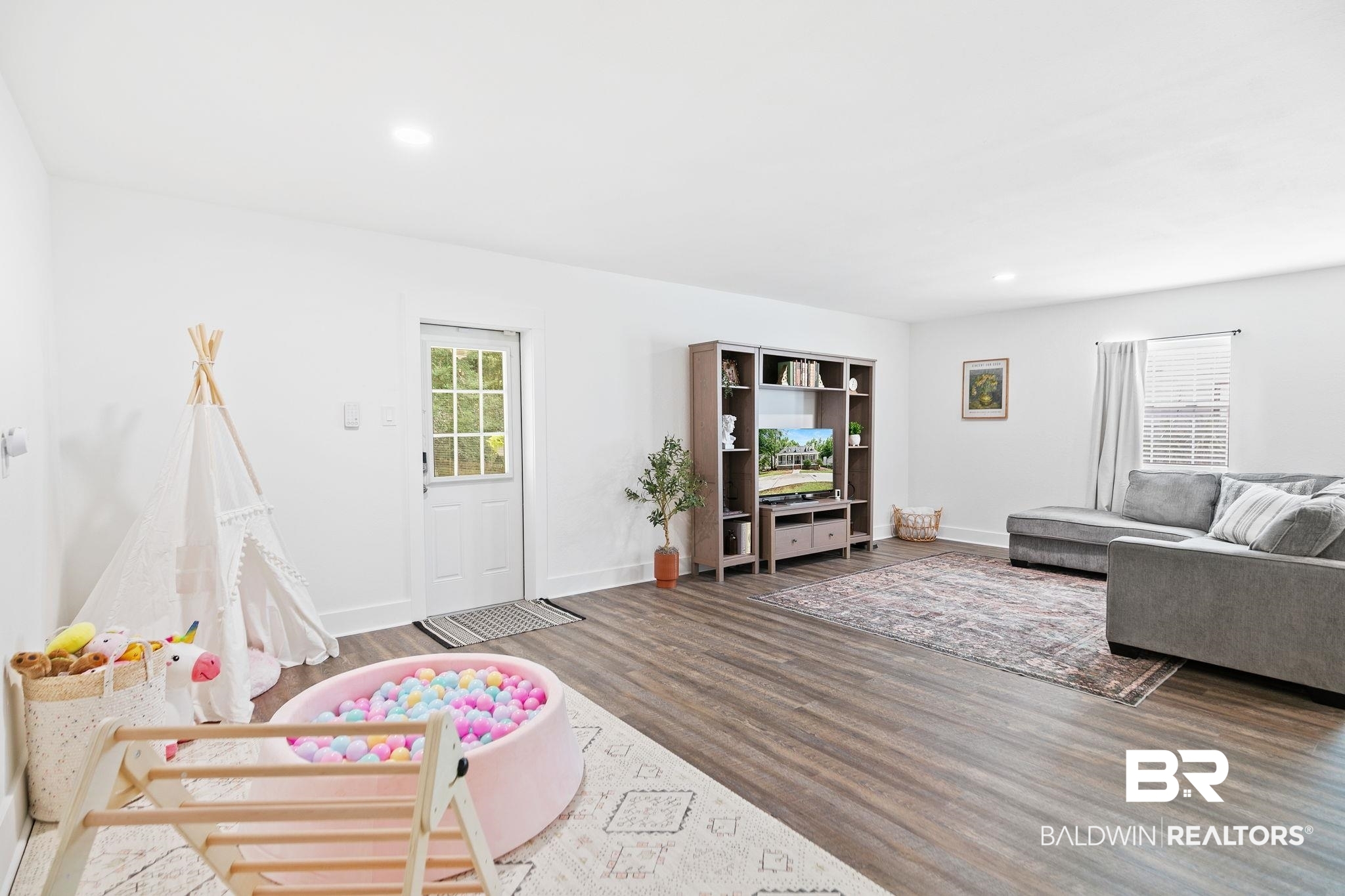 342 Ridgewood Drive Daphne, AL 36526 - Photo 23 of 36 Living room featuring wood-type flooring