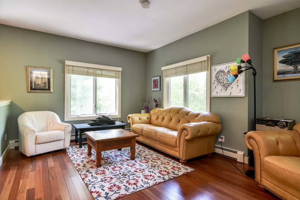 60 Lantern Lane Needham, MA 02492 - Photo 14 of 36 a living room with furniture and a window