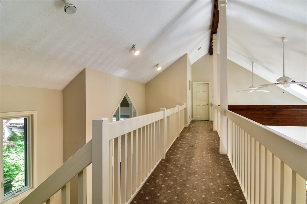 60 Lantern Lane Needham, MA 02492 - Photo 16 of 36 a view of a hallway with window