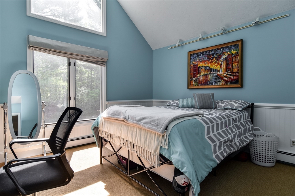 60 Lantern Lane Needham, MA 02492 - Photo 17 of 36 a bedroom with a bed chair and window