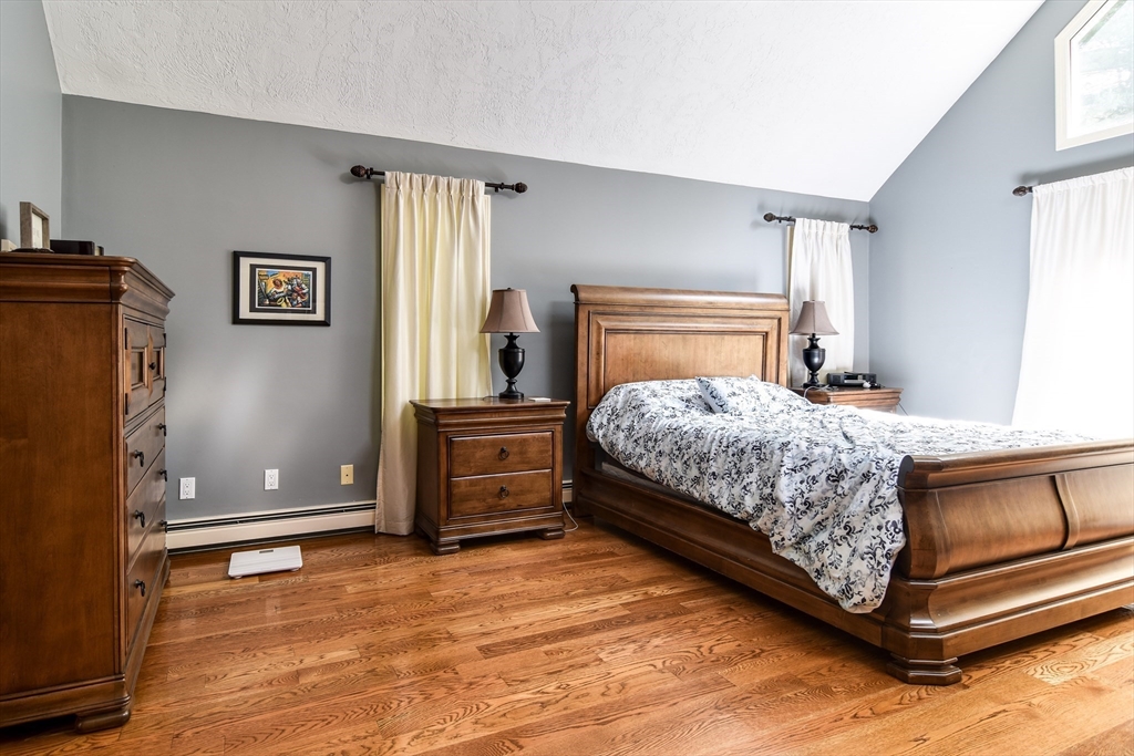 60 Lantern Lane Needham, MA 02492 - Photo 21 of 36 a bedroom with a bed and a window