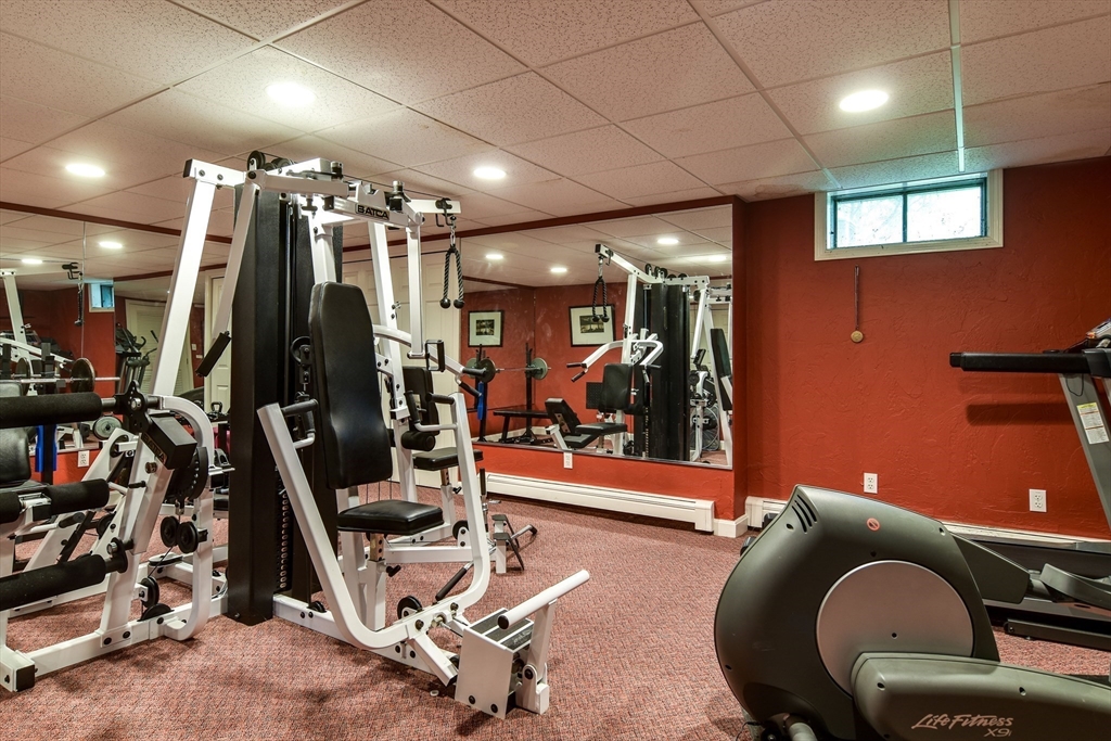 60 Lantern Lane Needham, MA 02492 - Photo 23 of 36 a view of a room with gym equipment