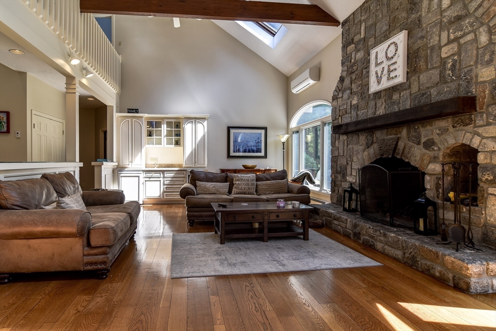 60 Lantern Lane Needham, MA 02492 - Photo 5 of 36 a living room with furniture and a fireplace