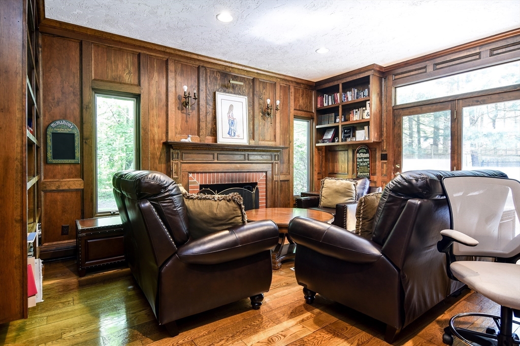 60 Lantern Lane Needham, MA 02492 - Photo 7 of 36 a living room with furniture or couch and a fireplace