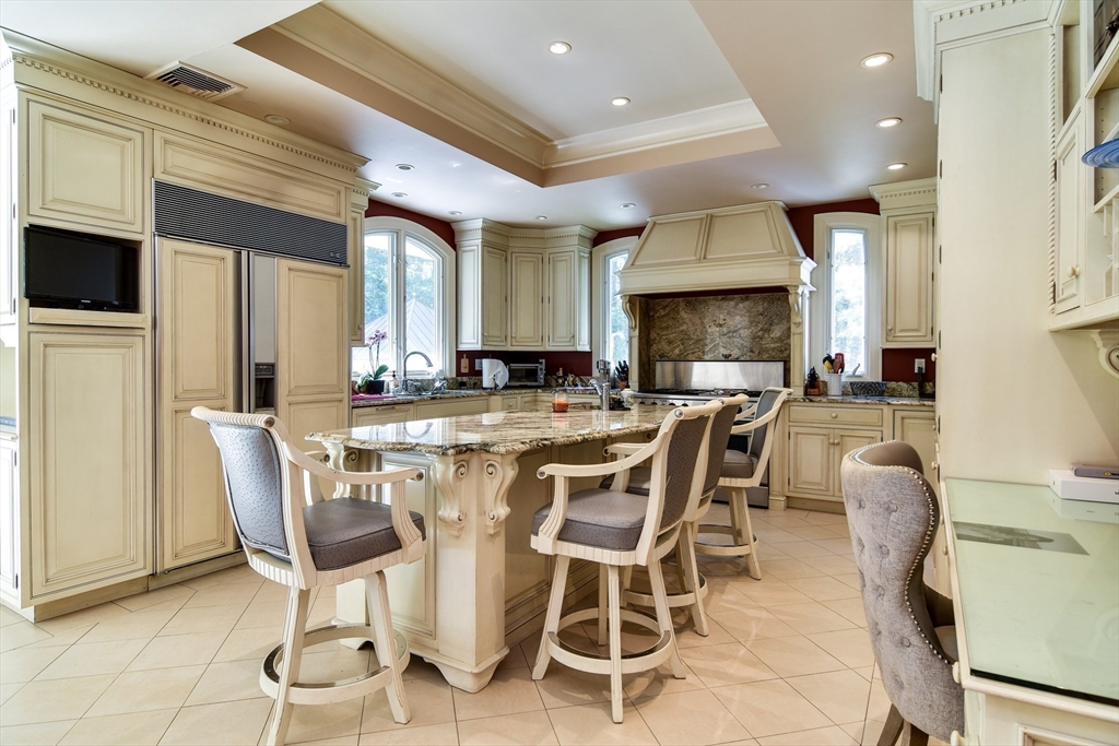 60 Lantern Lane Needham, MA 02492 - Photo 8 of 36 a view of a dining room with furniture