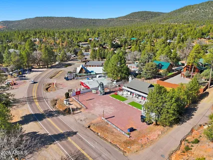an aerial view of residential house and outdoor space
