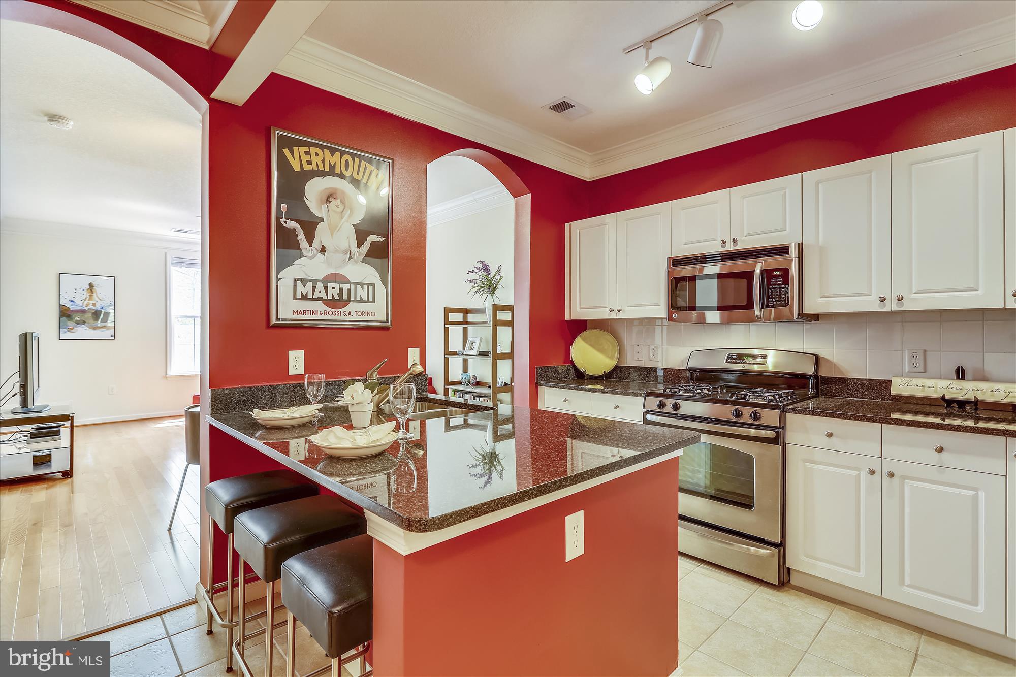 7 Booth Street, Unit 211 Gaithersburg, MD 20878 - Photo 1 of 33 Kitchen w/ Stainless Steel Appliances and Granite