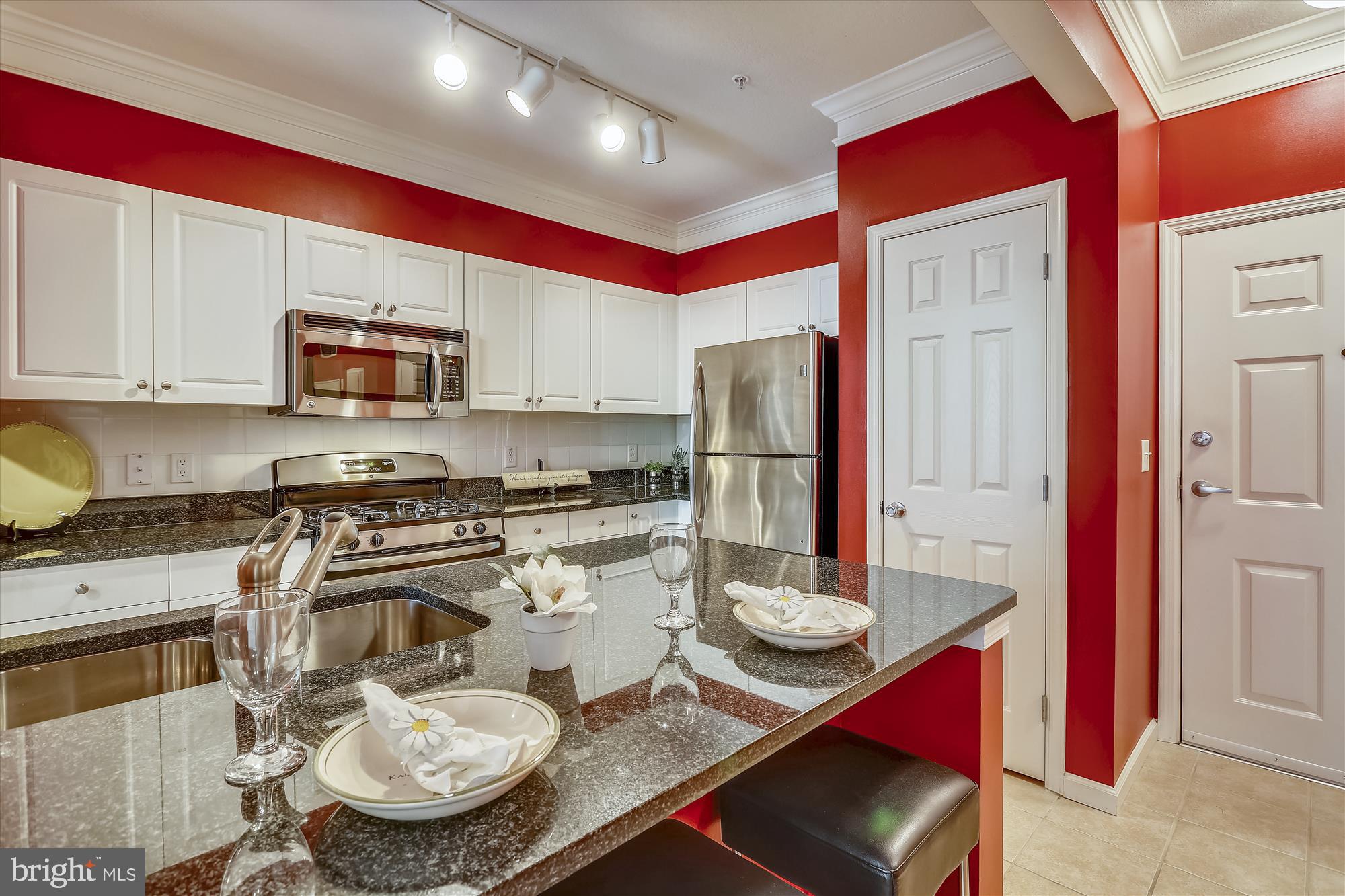 7 Booth Street, Unit 211 Gaithersburg, MD 20878 - Photo 2 of 33 Kitchen w/ Stainless Steel Appliances and Granite
